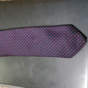 Yves Saint Laurent tie.. read